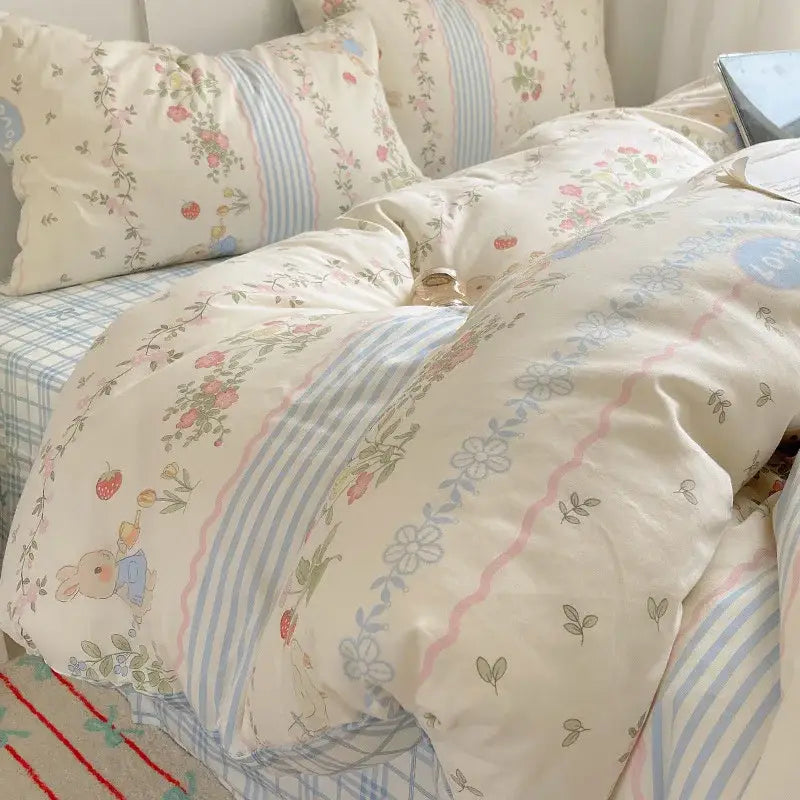 Cream-colored cotton bedding set with soft floral and striped pattern and pastel accents for bedroom decorbites cartoon pattern