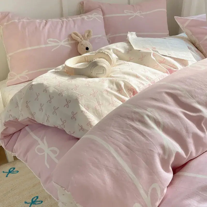 Soft pink and white cotton bedding set with delicate bow patterns for decorbites cartoon pattern bedroom decor