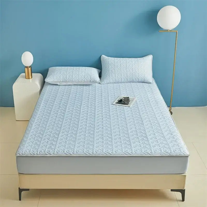 Light blue quilted latex fitted sheet set with subtle geometric pattern ideal as a comfortable bedroom bed pad