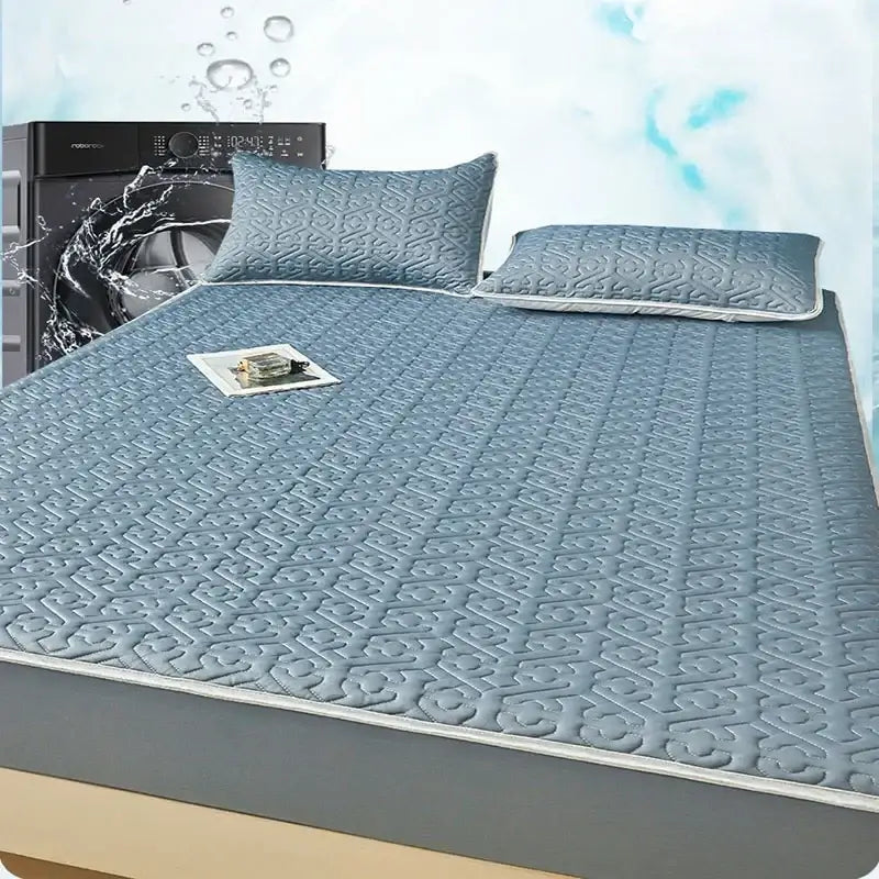Light blue quilted latex fitted sheet set with matching pillows and gray border for bedroom bed pad