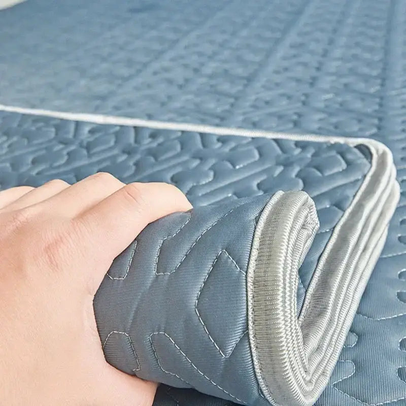 Light blue quilted latex fitted sheet set with textured pattern and gray elastic edge for bedroom bed pad use