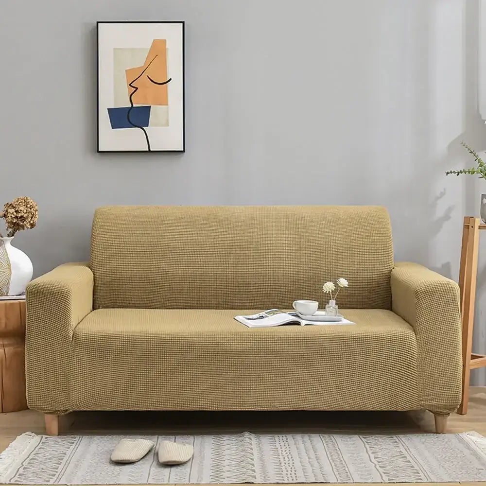 Beige textured fabric sofa cover with subtle woven pattern for living room decorbites 3d quilted thicken sofa slipcover