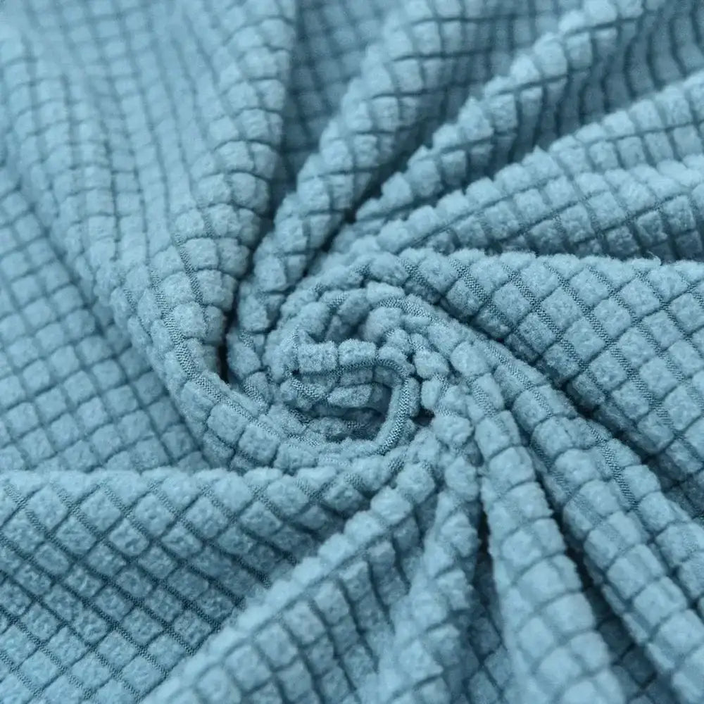Light blue quilted thicken sofa cover with corduroy texture and subtle grid pattern by decorbites 3d quilted for living room