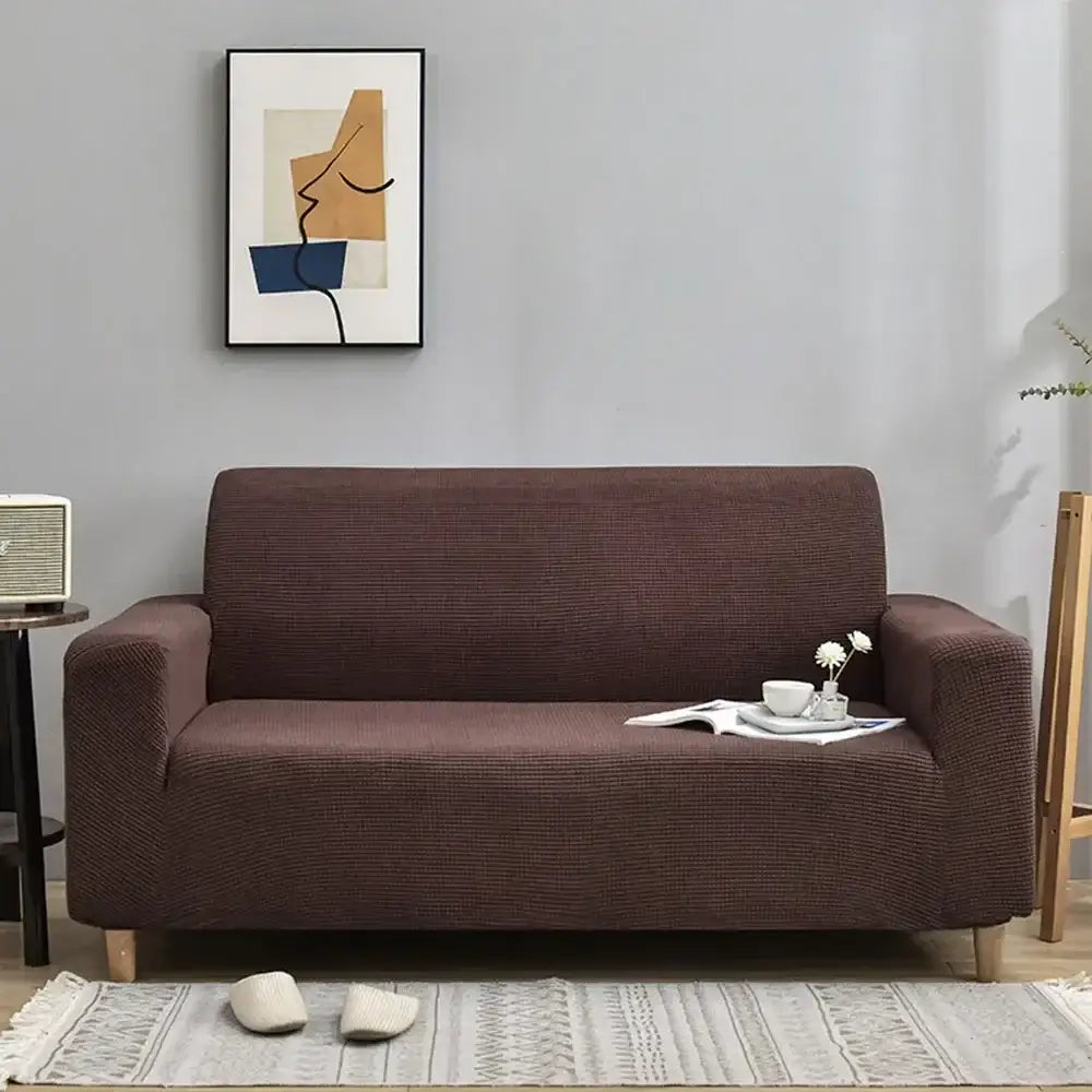 Brown textured sofa cover with a snug stretchy fit paired with light blue quilted thicken sofa decorbites 3d quilted slipcover