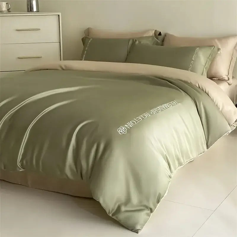 Silk-like sage green duvet cover with subtle white embroidery in light blue satin cotton decorbites cotton embroidery bedding set