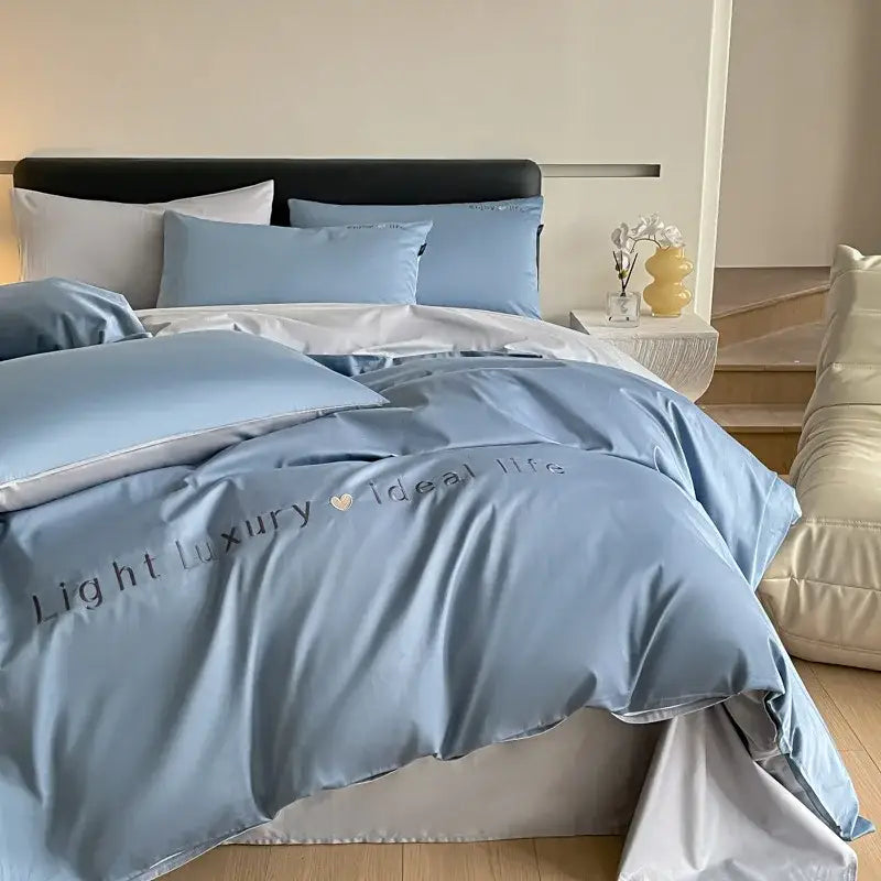 Light blue satin embroidery bedding set with light luxury heart ideal life script for bedroom decorbites 120s long
