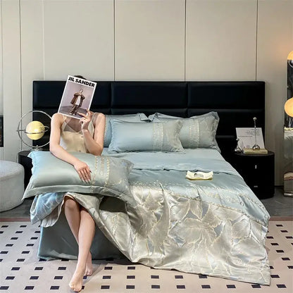 Light blue satin ice silk summer quilt with subtle gold leaf embroidery and matching pillow sham from decorbites ice silk