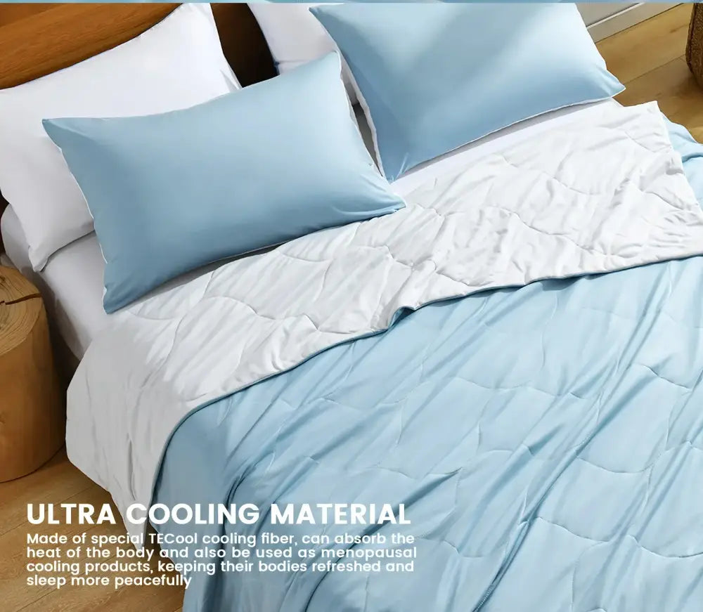 Light blue and white quilted cooling comforter with subtle textured pattern by decorbites for bedroom use