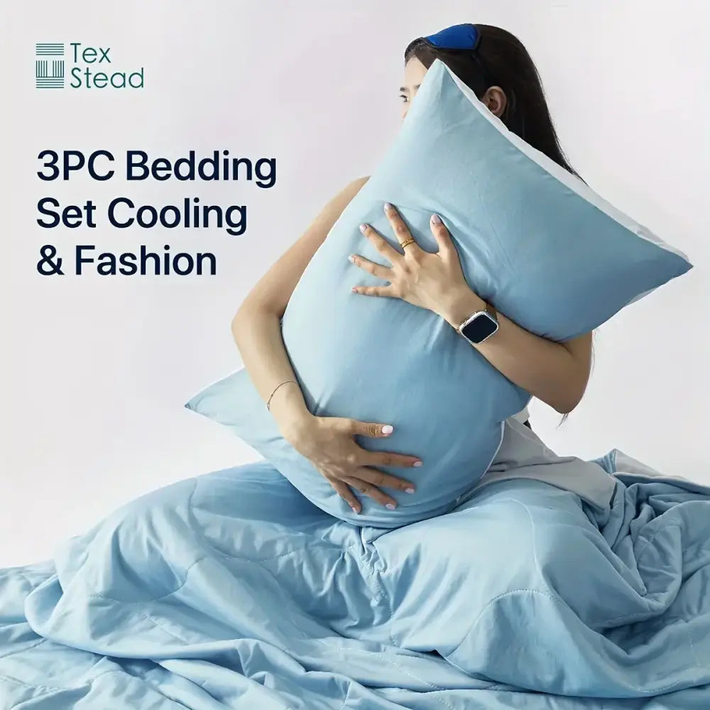 Light blue and white quilted cooling comforter with soft smooth fabric designed for hot sleepers by decorbites