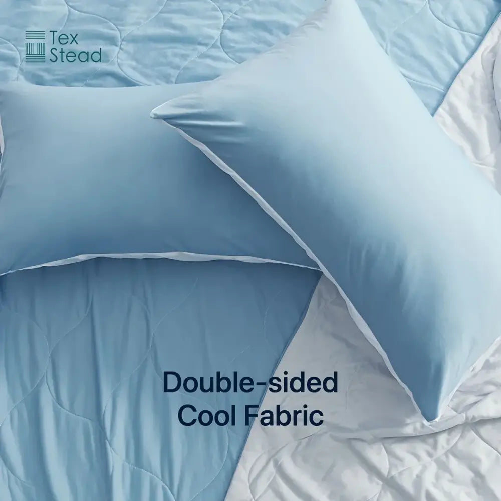Light blue and white quilted cooling comforter pillowcases with white piping and double-sided cool fabric by decorbites cooling