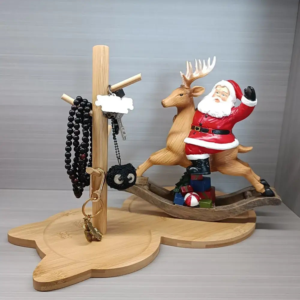 Light brown wooden key rack holder with santa claus figurine and beads on bamboo stand for living room storage