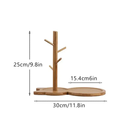Light brown bamboo tree-shaped mug stand with wide base and branching arms as a key rack holder for living room storage