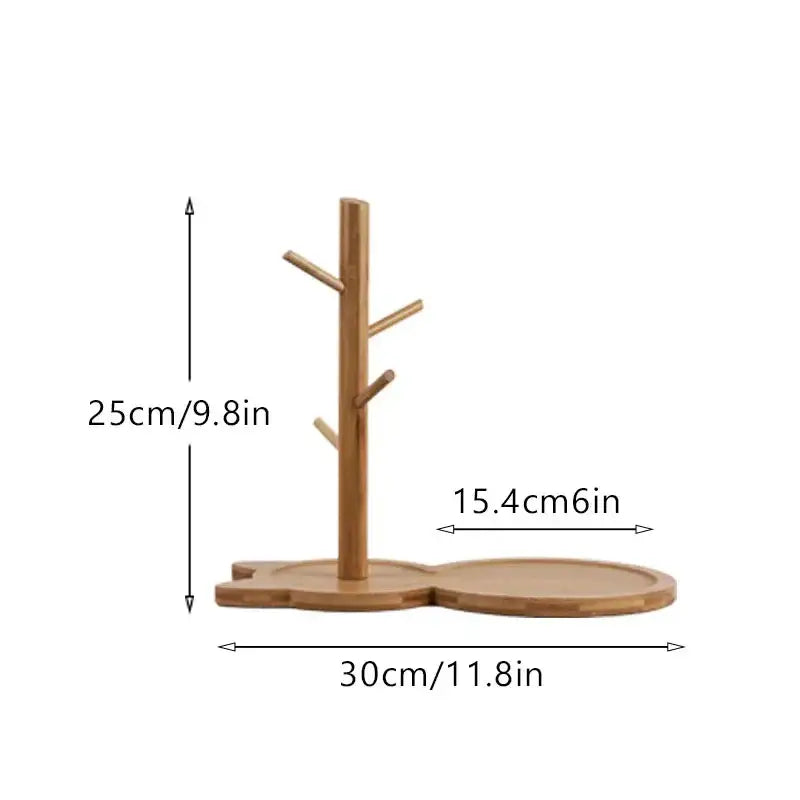 Light brown bamboo tree-shaped mug stand with wide base and branching arms as a key rack holder for living room storage