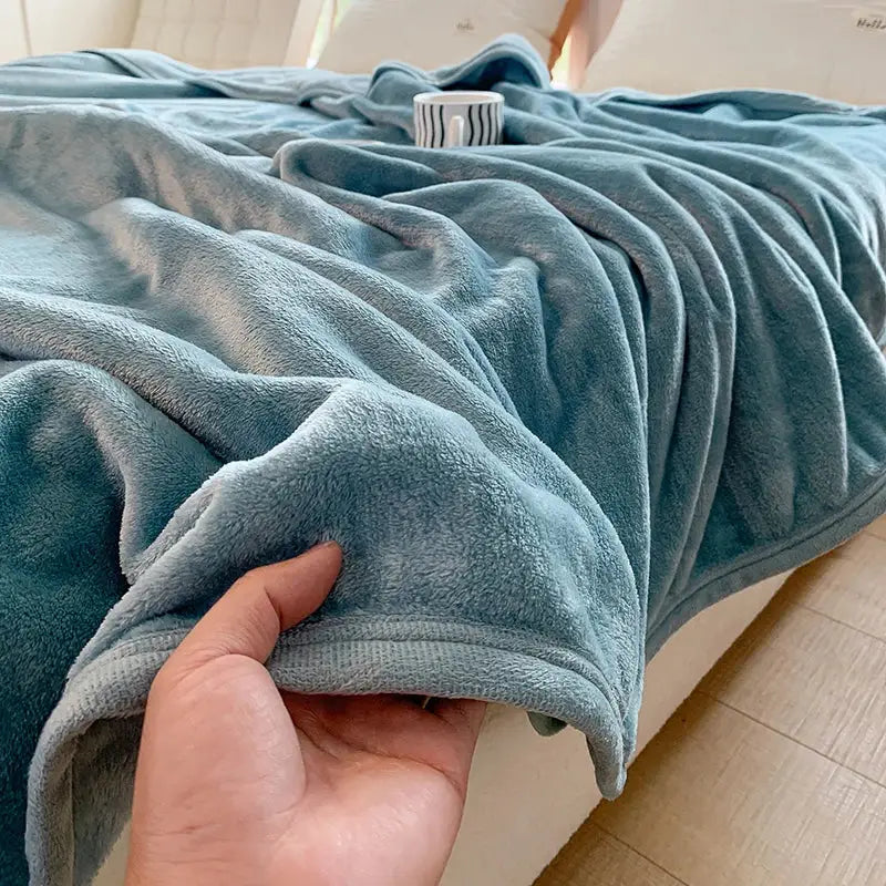 Light gray coral velvet summer blanket with soft teal plush texture ideal for cozy bedroom decorbites coral velvet throw