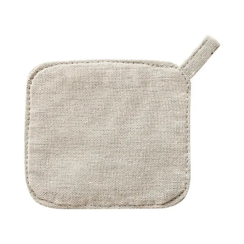 Beige linen pot holder with matching fabric loop handle complementing the light gray cotton linen coaster set decorbites cotton linen