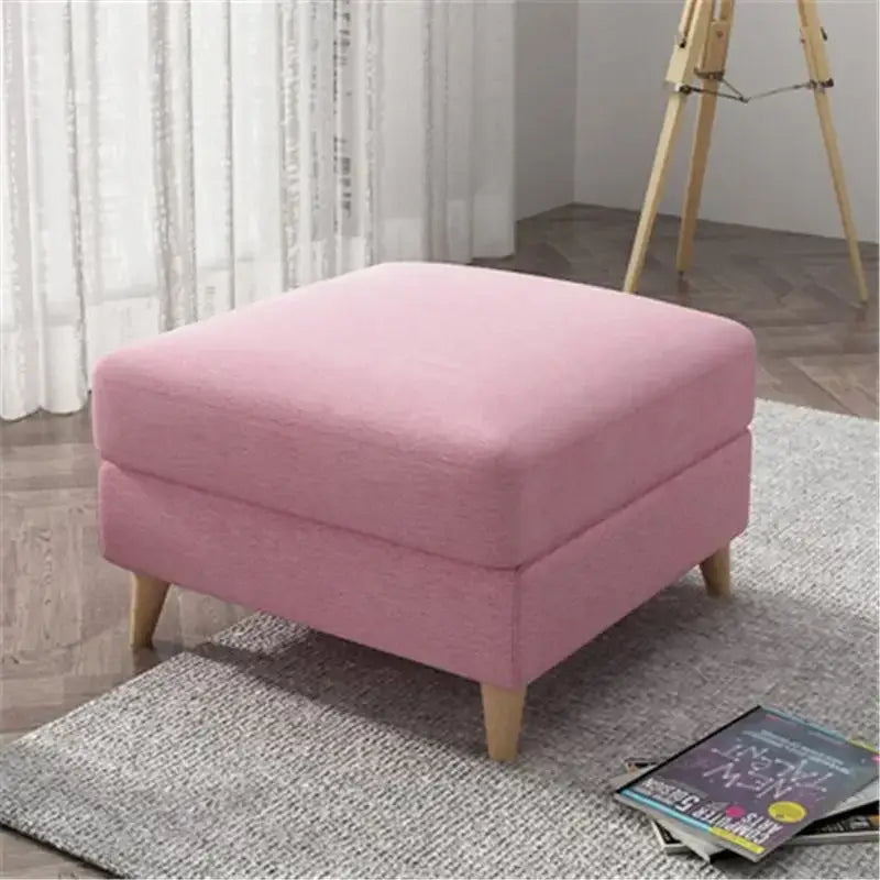 Light gray jacquard square stool cover on pink upholstered ottoman with wooden legs by decorbites jacquard square