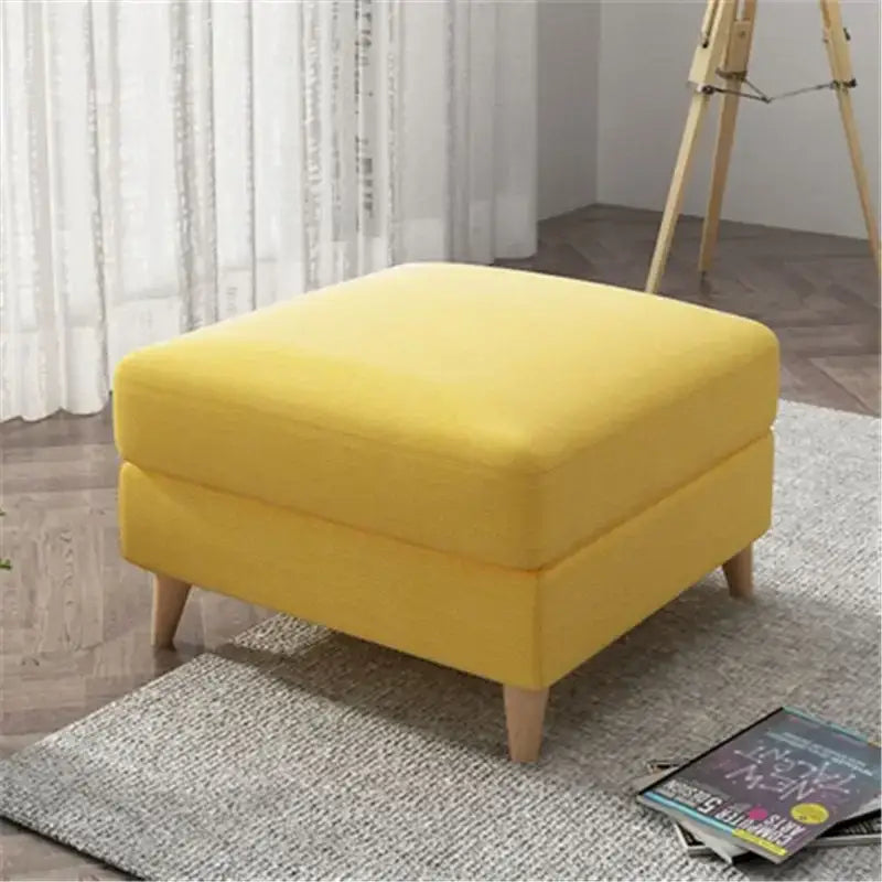 Bright yellow upholstered ottoman with wooden legs shown without light gray jacquard square stool cover decorbites jacquard square