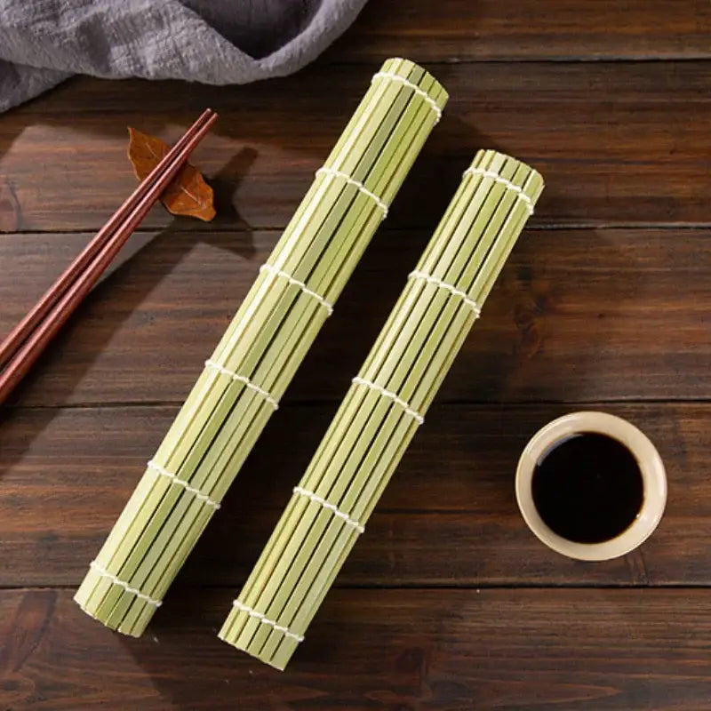 Light green bamboo sushi rolling mat set with two mats secured by white string for kitchen diy sushi rolling