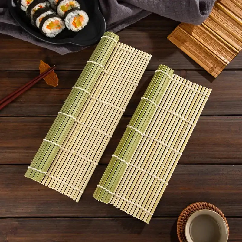 Two light green bamboo sushi rolling mats secured with white string in a rolling mat set for kitchen diy use