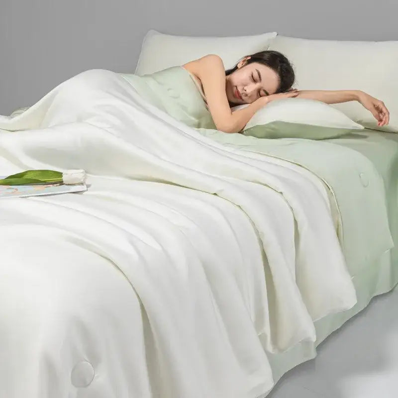 Soft white satin duvet cover set with sage green accents and button detailing in decorbites cool ice silk quilt set