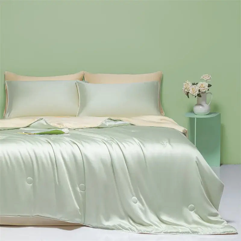 Light green and cream cool ice silk quilt set with pale green satin duvet cover and subtle button detailing by decorbites cool ice