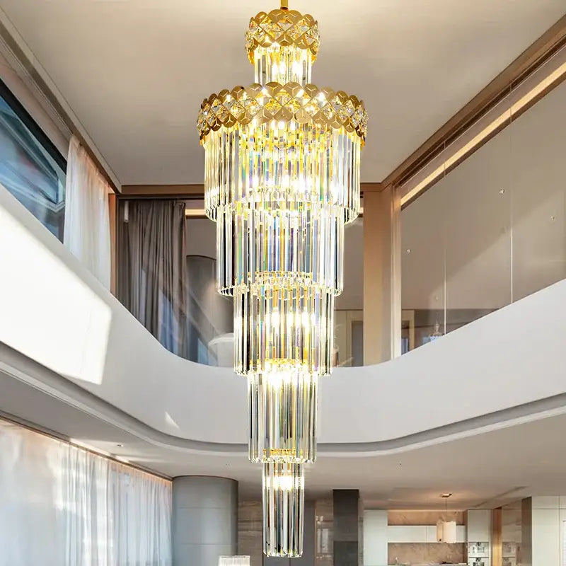 A multi-tiered gold luxury crystal chandelier with cascading clear glass rods for light luxury decorbites living room lighting