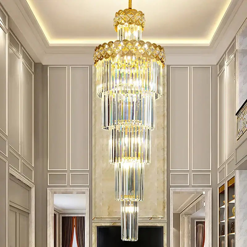 A multi-tiered light luxury crystal chandelier with gold accents and cascading clear glass rods for living room decorbites light luxury design