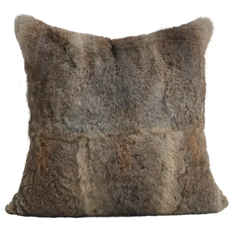 A light luxury designer pillow cover in natural rabbit fur with subtle brown and gray tones for living room decor