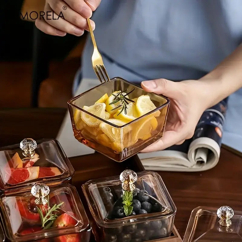 Amber-tinted square glass fruit plate with crystal knob lid and gold accents in decorbites light luxury style
