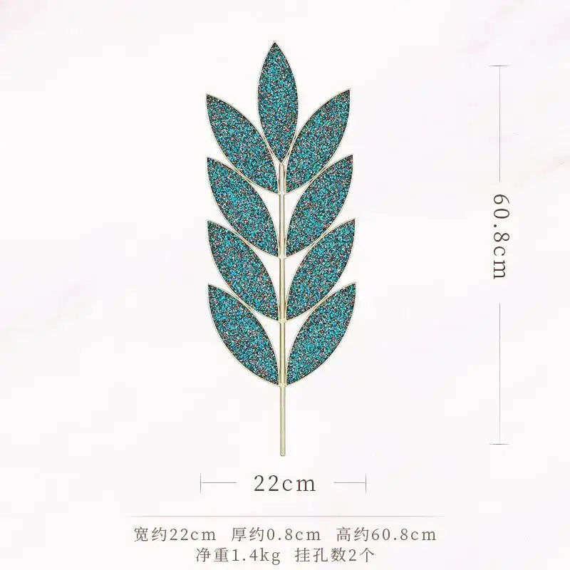 A glittery teal leaf-shaped decorbites light luxury iron pin with a metallic stem for wall decoration