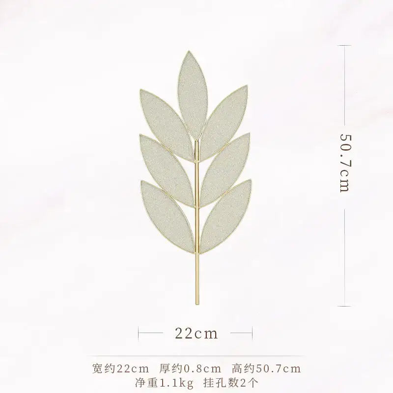 Gold-toned leaf shaped decorative pin with five symmetrical leaves in light luxury iron for wall decoration decorbites light luxury