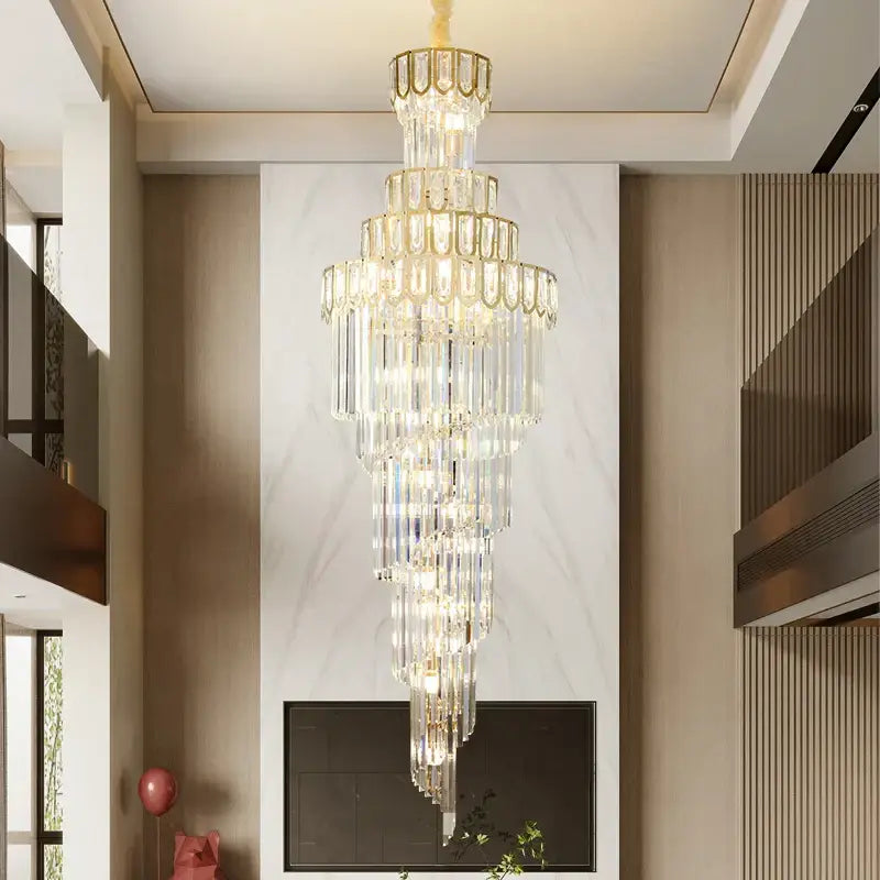 A light luxury rotating crystal chandelier with gold metal accents and clear faceted crystals for villa living room decorbites light luxury