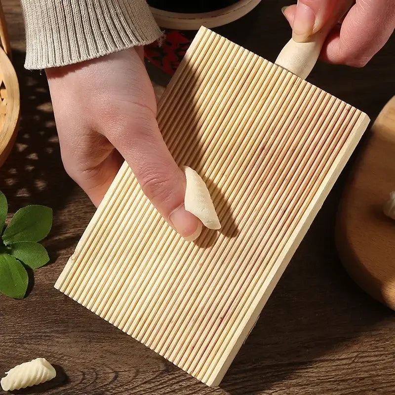 Light wood ridged garganelli board pasta maker tool with parallel ridges and handle by decorbites garganelli board