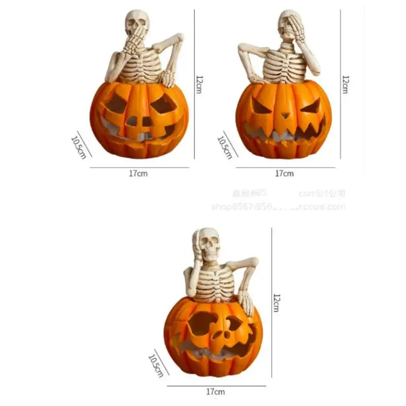 Orange carved pumpkin skeleton figurines with white lighted skull pumpkin skeleton figures seated inside for decor