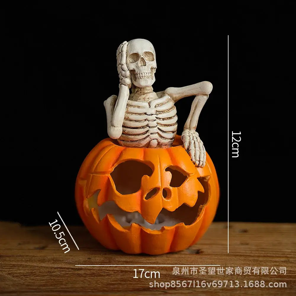 White skeleton figurine with detailed bone structure inside an orange lighted skull pumpkin skeleton lantern for living room decor
