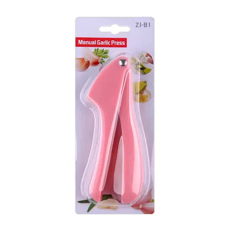 Pink manual garlic press with ergonomic design and metallic button from decorbites garlic rammers collection