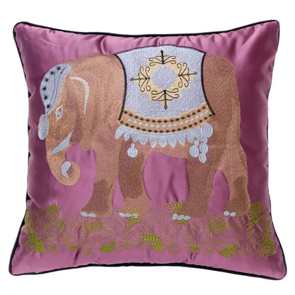 A plush pink cushion cover with ornate decorbites elephant embroidery featuring silver and gold saddle for sofa decor