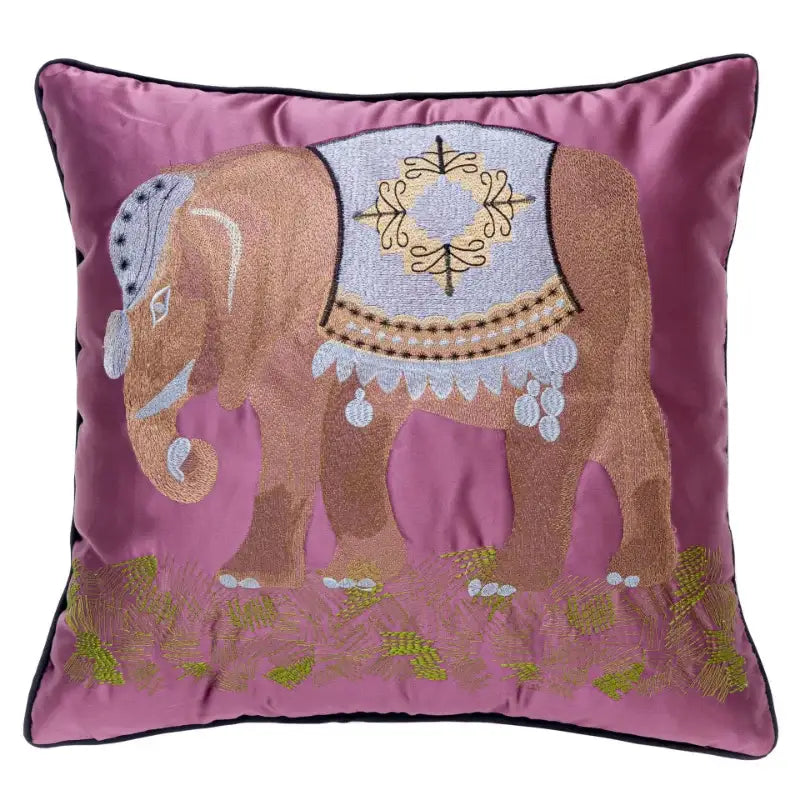 A plush pink cushion cover with ornate decorbites elephant embroidery featuring silver and gold saddle for sofa decor
