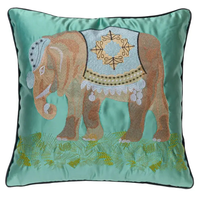 Lime green satin elephant embroidery sofa cushion cover with teal satin and decorbites elephant embroidery on green grass