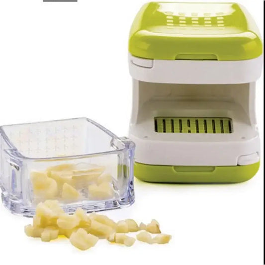 Lime green and white plastic garlic press cutter with a clear kitchen storage container for easy garlic pressing