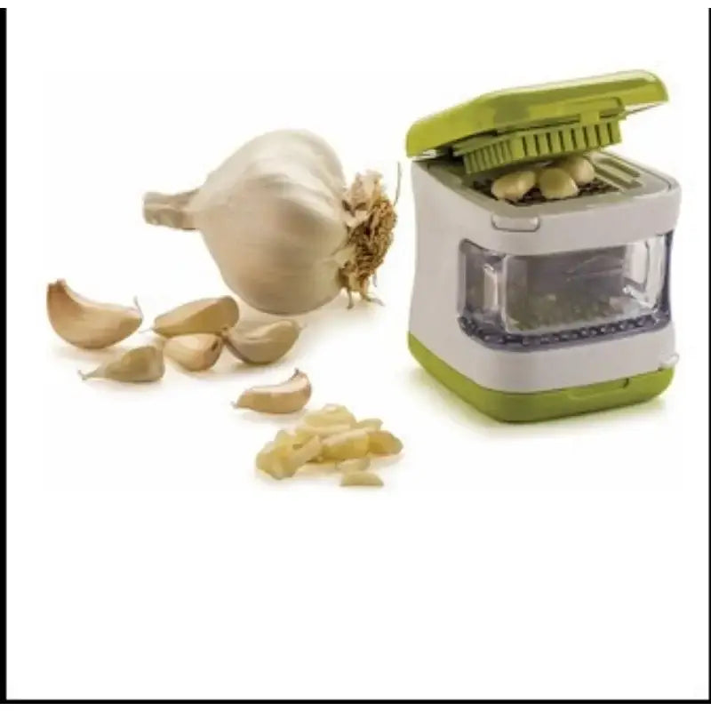 Lime green and white garlic press cutter with clear window showing crushed cloves and built-in kitchen storage container