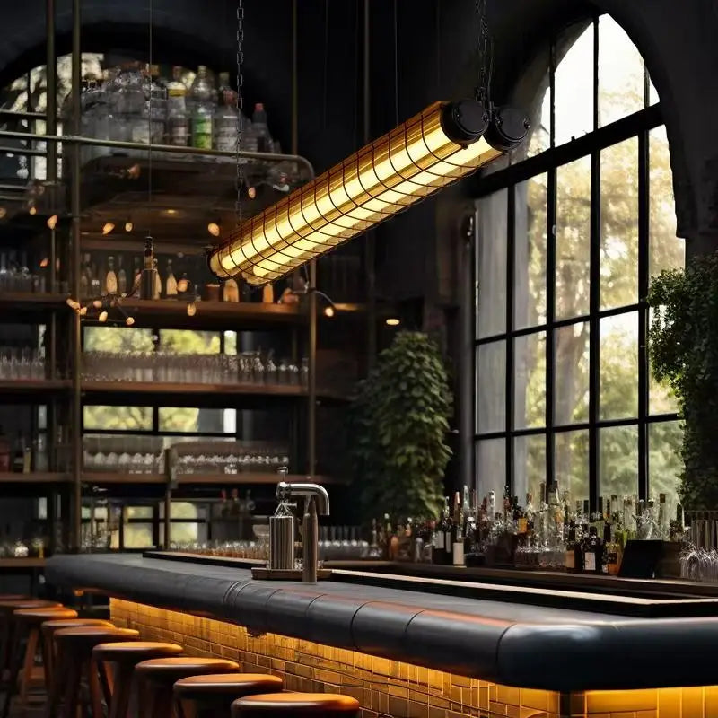 Industrial-style linear chandelier glass pendant lamp with segmented glass tubes and warm yellow glow in black metal frame