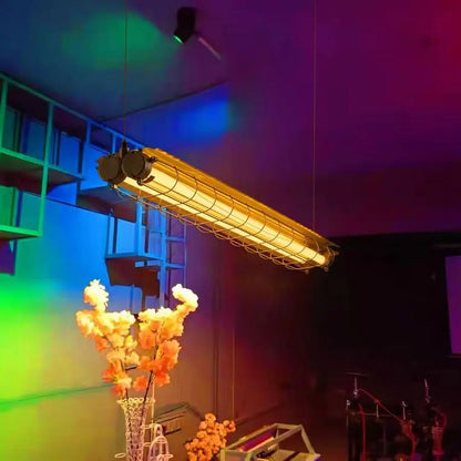 Linear chandelier glass pendant lamp featuring an industrial yellowish-gold metal housing with protective wire cage