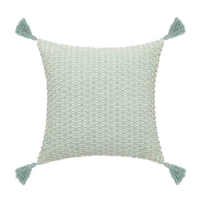 Square light mint green cushion cover with textured woven pattern and tassels featuring decorbites linen embroidery leaves