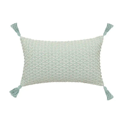A light mint green cushion cover with linen embroidery leaves textured pattern and matching tassels for decorbites linen embroidery