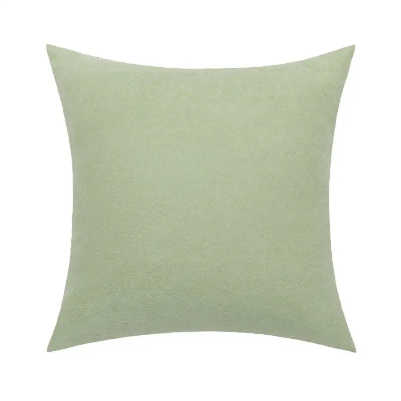 A soft square sage green cushion cover with textured decorbites linen embroidery leaves for living room decor
