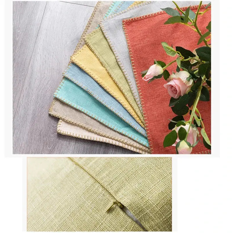 A collection of decorbites linen fringe cushion covers in neutral tones featuring textured weave and stitched edges