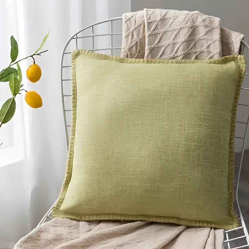 Light green linen fringe cushion cover with textured frayed edge for neutral tones living room decorbites linen fringe pillow