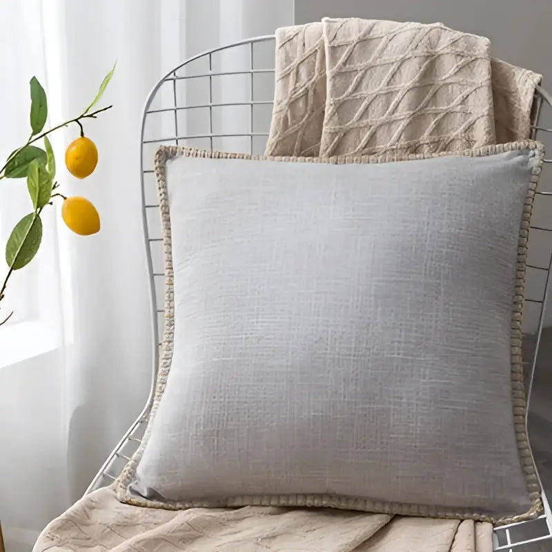 Light gray linen fringe cushion cover with textured woven border for neutral tones living room decorbites linen fringe