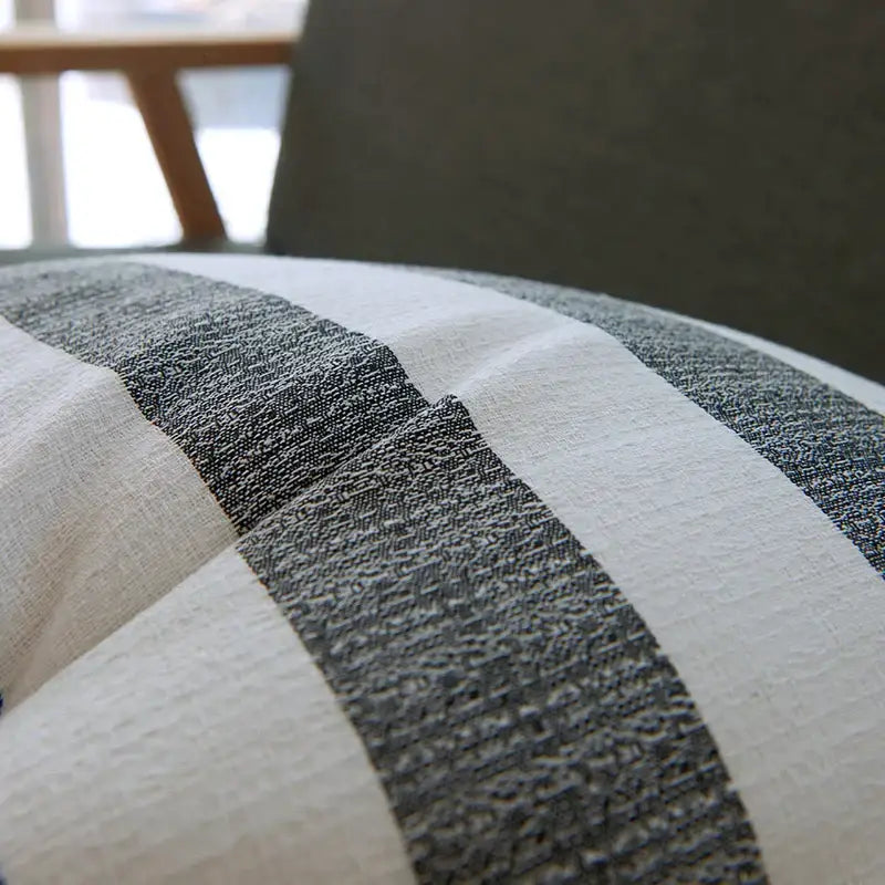 A linen stripe cushion cover with bold charcoal gray and off-white textured stripes for living room decorbites linen stripe